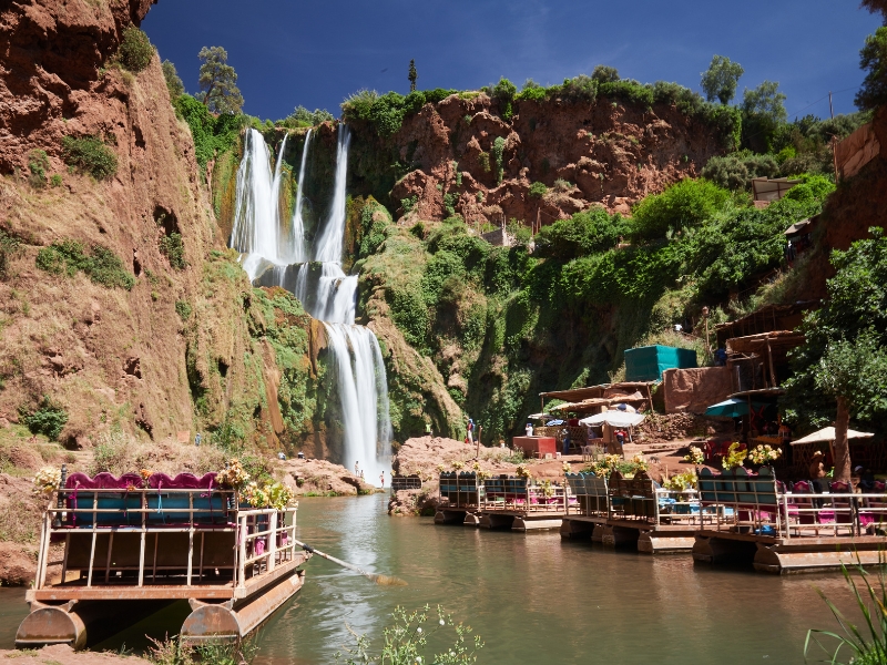 Panoramic view of Ouzoud Falls with olive groves